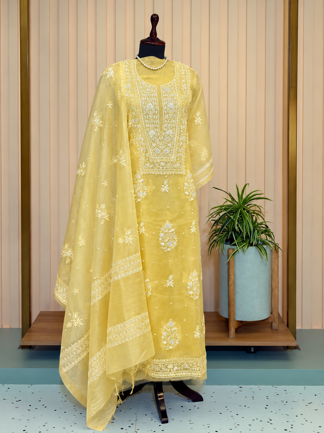 Yellow Organza Silk Chikankari – mannequin display showing chikankari embroidery and fabric detail