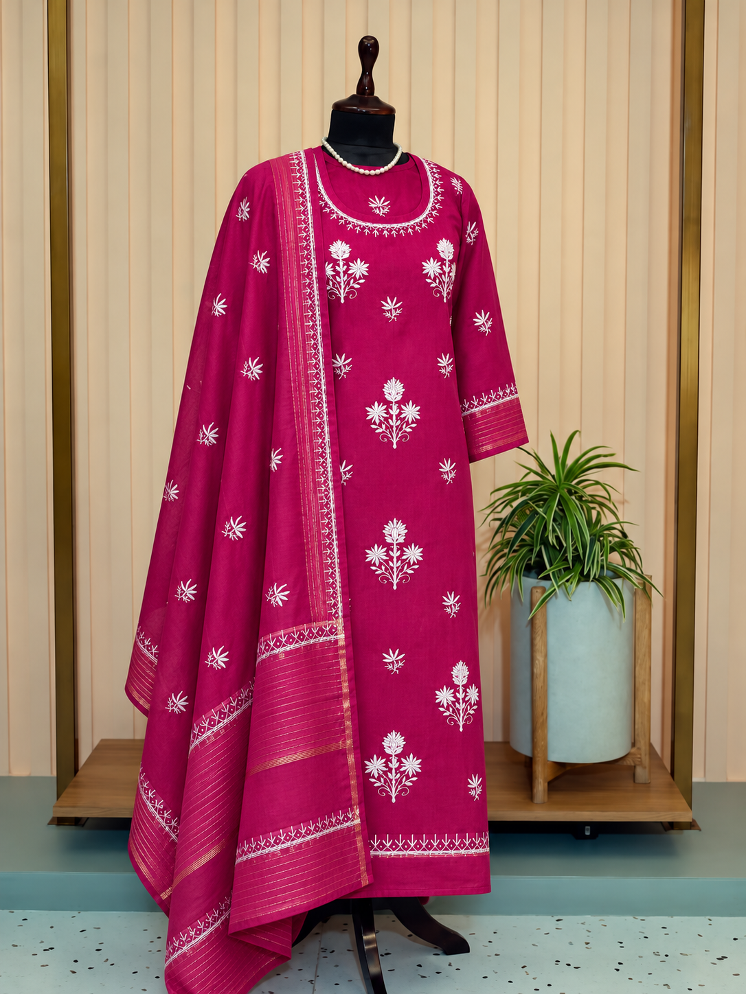 Magenta Wine Chikankari Suit - Semi-stitched – mannequin display showing chikankari embroidery and fabric detail