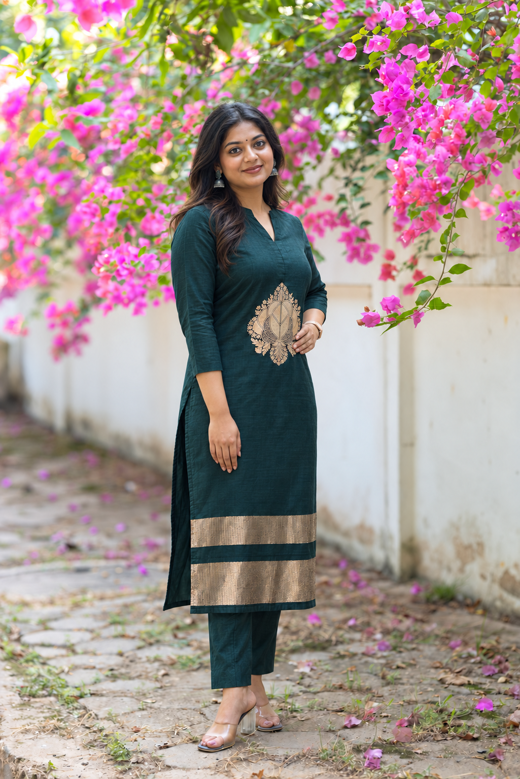 Dark Green Lotus-Motif Co-ord Set styled on a model in a bougainvillea garden